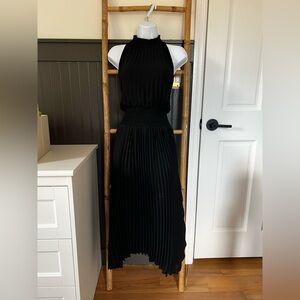 1. State Black High Low Pleated Dress